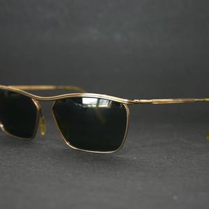 Occhiali da sole vintage Polaroid 433 stile biker, oro anni '60, montatura a sopracciglio, ottime condizioni, taglia media Amor Carlton 56-14-140