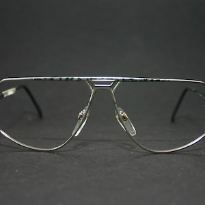 Okulary przeciwsłoneczne L'Art z lat 80., pilotki, vintage, srebrne, oprawki, lata 80., nowe, stare, nieużywane, rozmiar duży, 59-12-140, średni, duży, płaskie
