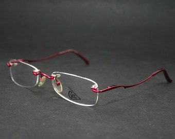 Eyeglasses Rimless Stylish Modern Curvy Shiny Pink 90's Medium Sized 52-20-140 Spring Hinges New Old Stock NOS