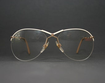 Lunettes de vue forme goutte sans monture aviateur or blanc cassé fabriquées dans l'ouest de l'Allemagne des années 1980, taille moyenne 56-16-135 lunettes de vue neufs anciens stocks NOS