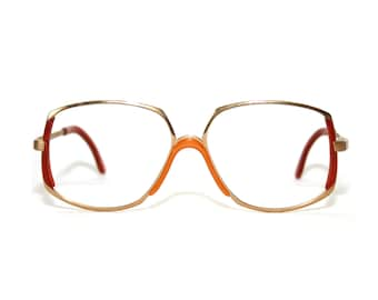 Gafas peculiares Marco Rodenstock Exclusiv 601 NUEVO Old Stock Tamaño mediano 54-15-130 Gafas de ojos Abuela de la década de 1970 Oro pesado Rojo Naranja