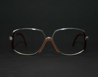 Marco de gafas Rodenstock Exclusiv 601 Quirky NUEVO Old Stock Tamaño mediano 54-14-130 Gafas Mujer 1970 Abuela Pesada Plata Rojo Naranja