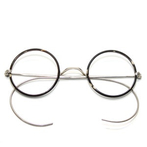 Lunettes de vue anciennes, nickel, neuf, ancien stock, nos années 1930, monture de lunettes rondes Windsor, embouts de câble, bras enroulés, petite taille 38-24-160 brun ivoire