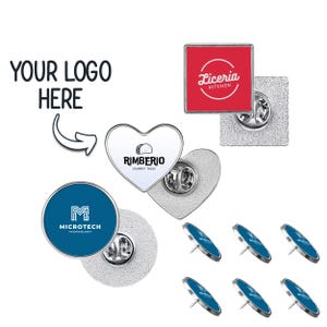 May include: Assortment of custom lapel pins with different shapes and designs.  The pins feature a heart, a square, and a circle.  The designs include a logo with the text "Rimberio Gourmet Tacos", a logo with the text "Liceria Kitchen", and a logo with the text "Microtech Technology".