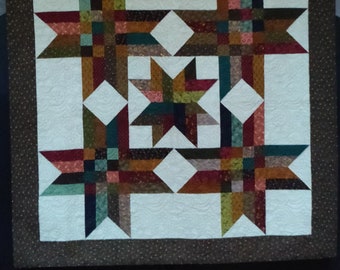 56 x 56 Fall Quilt Wall Table Topper. Premium Cotton fabric in multiple shades of blues, dark reds, greens and tans as neutral. Earth tones.