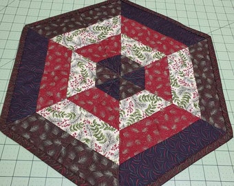 16x19 Quilted Christmas Holiday Winter Hexagon Centerpiece Christmas Table Topper, made from Winter Manor Deep reds and greens, with creams.