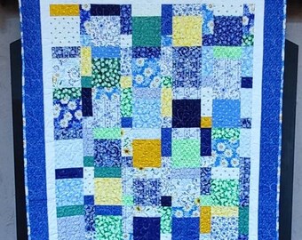 56 x 65 Quilt Wall Table Topper Cotton. Premium Cotton fabric in multiple shades of blues, yellows and white as neutral.