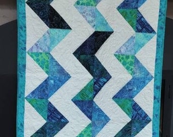 41x53 Wall, Throw, Lap, Modern Quilt,in zig zag pattern. 100% Cotton, in multiple shades of Aqua prints. From Pet free and smoke free home.