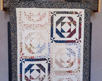 Large Lap Quilt throw 57x68 inches, beautiful florals in Navy, Roses and cream in the Disappearing Pinwheel Block. Pet free/smoke free home.