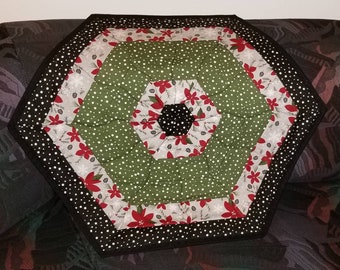 23x26 Quilted Christmas Centerpiece Hexagon Table Topper Black Cream Red and Green Quality Quilting Fabrics features Santa.