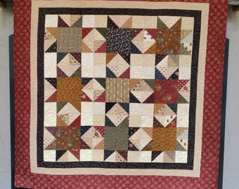 58x 58 Fall Quilt Wall Table Topper. Premium Cotton fabric in multiple shades of blues, dark reds, greens and tans as neutral. Earth tones.