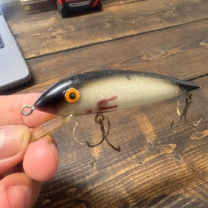 Vintage Gudebrod black and silver scale golden eye maverick fishing lure.  Rare fishing lure. Vintage fishing lure.
