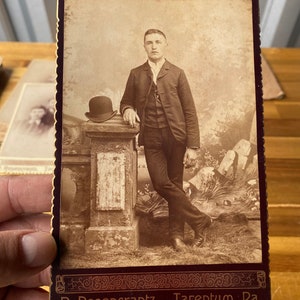Antique cabinet card photograph of gentleman with his cool hat. Antique photography