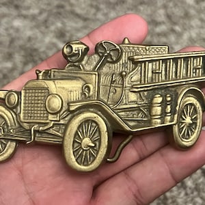 1979 antique car belt buckle Solid Brass . Vintage belt buckle