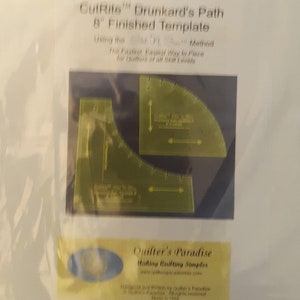 May include: A set of two yellow plastic quilting templates for Drunkard's Path quilt blocks. The templates are 8 inches in size and are labeled "GutRite™ Drunkard's Path 8" Finished Template". The packaging also includes the text "Using the Sht 'n Method The Fastest Easiest Way to Place for Quilters of all Skill Levels".
