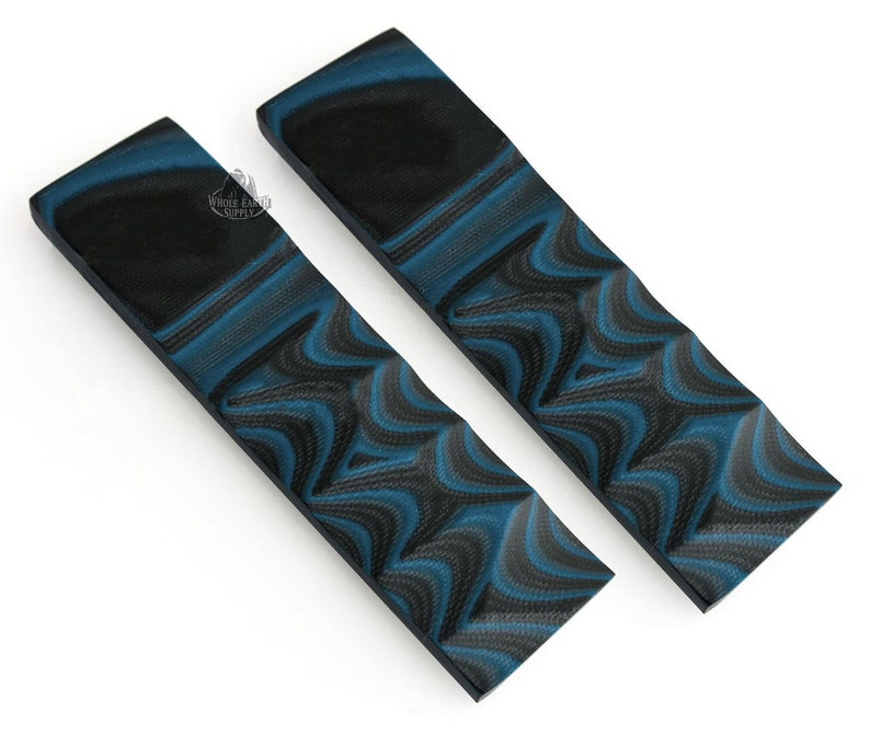 May include: Two black and blue patterned knife scales. The scales have a swirling pattern of black and blue.