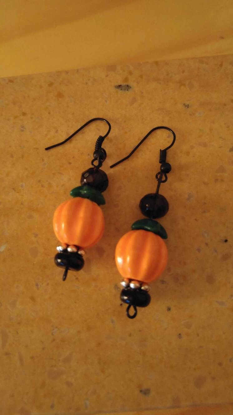 Pumpkin earrings with black accents for Halloween. | Etsy