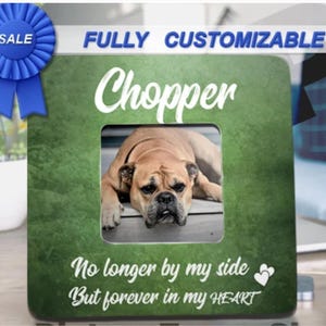May include: A green square photo frame with the name "Chopper" in white script. The frame holds a photo of a brown bulldog. Text at the bottom reads "No longer by my side But forever in my HEART."