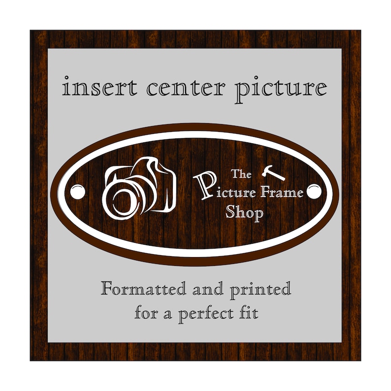 May include: A wooden picture frame with a gray center panel. The text "insert center picture" is at the top. An oval logo with a camera graphic and the text "The Picture Frame Shop" is in the center. The text "Formatted and printed for a perfect fit" is at the bottom.