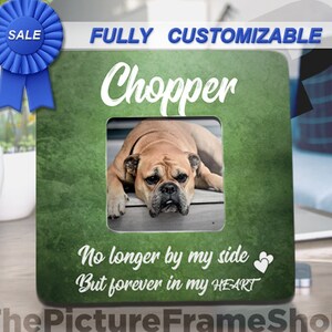 May include: A green picture frame with the name "Chopper" in white script. The frame features a photo of a dog and the text "No longer by my side But forever in my HEART". A blue ribbon with "SALE" is in the upper left corner.