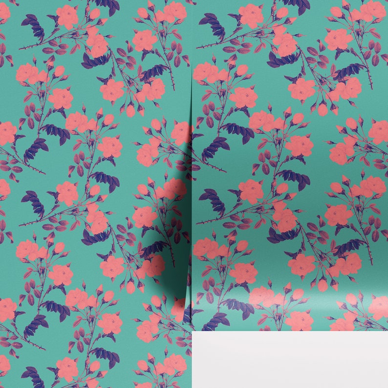 May include: A teal blue background with a repeating pattern of pink roses and dark blue leaves. The roses are in various stages of bloom, with some fully open and others still in bud.