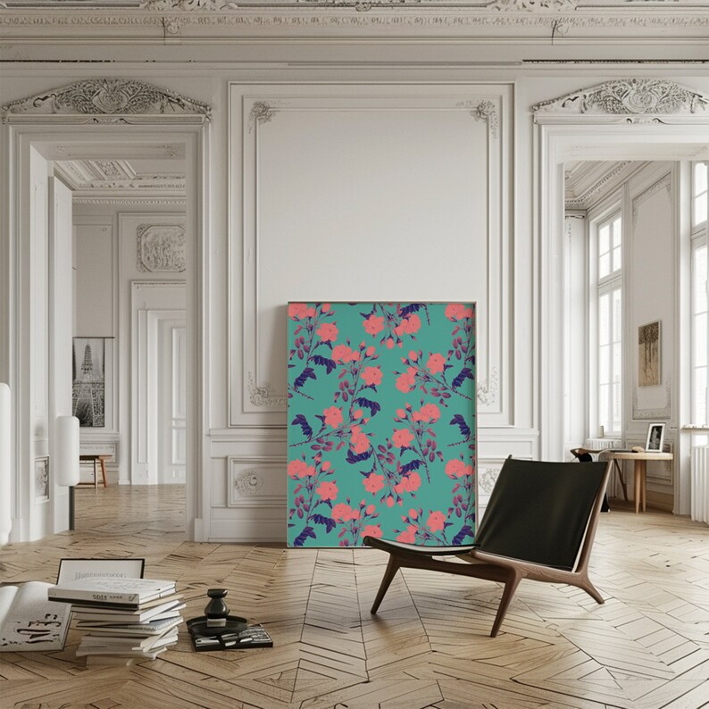 May include: A teal floral print artwork hangs on a white wall in a room with white trim and hardwood floors. A black leather chair sits in front of the artwork.