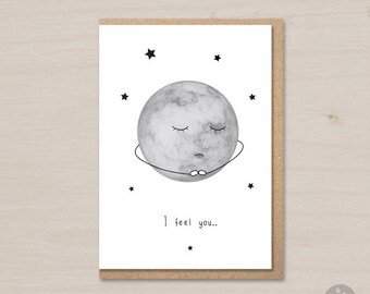 May include: A white card with a black and white illustration of a moon with a sad face and the text "I feel you."