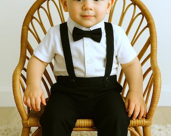 Traje de lino y algodón negro para portar anillos, pajarita y pantalones con tirantes.
