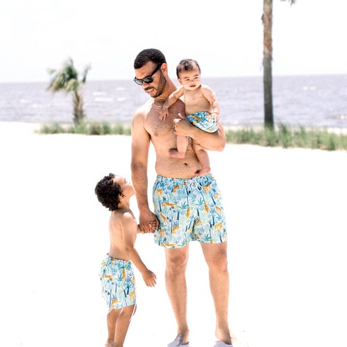 father and son matching swim shorts next