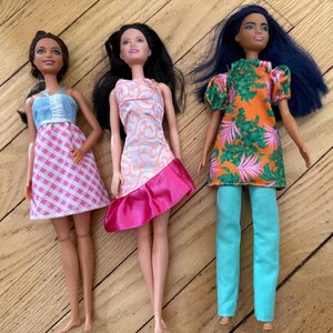green emerald velvet dress Barbie Fashionistas Doll with Black Hair & Twist & Turn Dress #214 –  Maziply Toys main image 0
