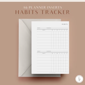 Può includere: Un inserto per planner A6 stampabile per tenere traccia delle abitudini. La pagina è divisa in due sezioni, ciascuna con uno spazio per il numero della settimana, una ricompensa e un'abitudine. Ogni sezione ha una griglia per tenere traccia dell'abitudine per ogni giorno della settimana, dal lunedì alla domenica.