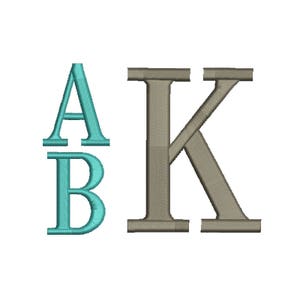 May include: A monogram design featuring the letters A, B, and K. The letters A and B are in a teal blue color, while the letter K is in a gray color.