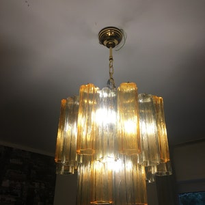 Contemporary Murano Glass "Tronchi" chandelier with a gold 24k metal frame