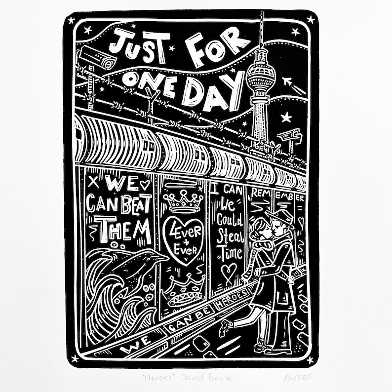 May include: Black and white linocut print of a couple kissing in front of a building with graffiti. The graffiti includes the text "We can beat them" and "We can be heroes". The building is in front of a tall tower with a star on top. The print is titled "Heroes - David Bowie" and signed "PSN785".