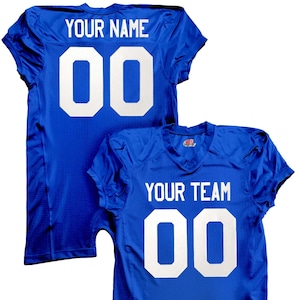 May include: A royal blue football jersey with white lettering. The back of the jersey says "YOUR NAME" and "00". The front of the jersey says "YOUR TEAM" and "00".