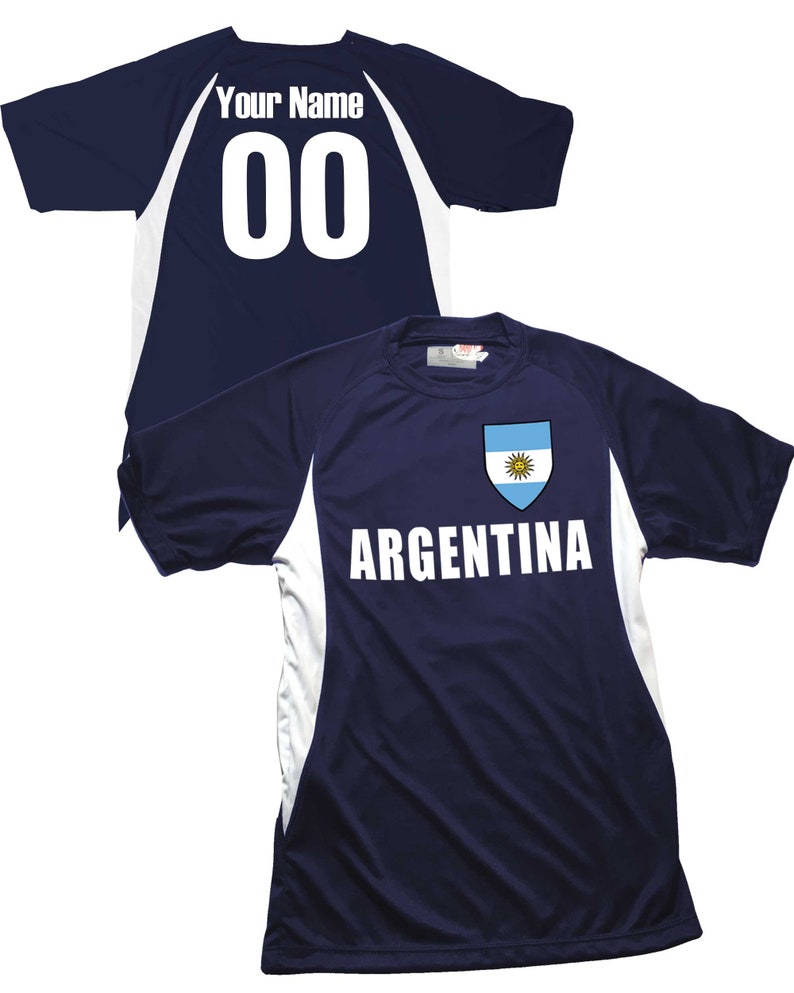 May include: A navy blue soccer jersey with white accents and the word "ARGENTINA" printed on the front. The jersey features the Argentine flag on the chest and a blank space on the back for a name and number.