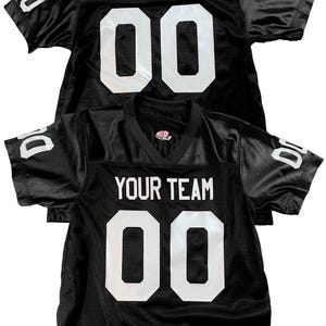 Black football jersey customized with just the name and number on the back in your choice of 18 professional team colors plus sleeve numbers