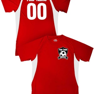 May include: Red soccer jersey with white accents. The back of the jersey has a white number "00" and the text "Your Name". The front of the jersey has a black and white soccer logo with the text "Your Team Soccer".