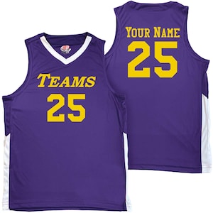 purple and white basketball jersey with gold heat applied vinyl lettering