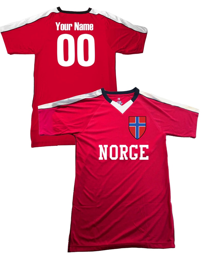 May include: Red soccer jersey with white trim and the text "NORGE" and the Norwegian flag on the front. The back of the jersey has the text "Your Name" and the number "00" in white.