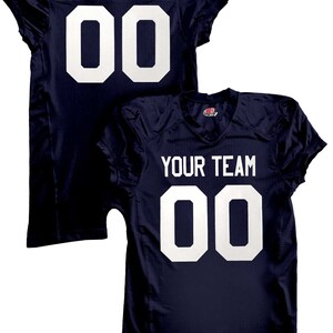 May include: Navy blue football jersey with white lettering. The back of the jersey says "YOUR NAME" and "00". The front of the jersey says "YOUR TEAM" and "00".