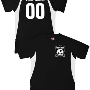 May include: Black soccer jersey with white accents. The back of the jersey has a white number "00" and the text "Your Name". The front of the jersey has a white shield with a soccer ball and the text "Your Team Soccer".