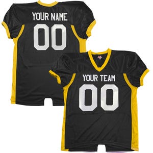May include: Black and gold football jersey with the text "YOUR NAME" and the number "00" on the back. The front jersey has the text "YOUR TEAM" and the number "00".