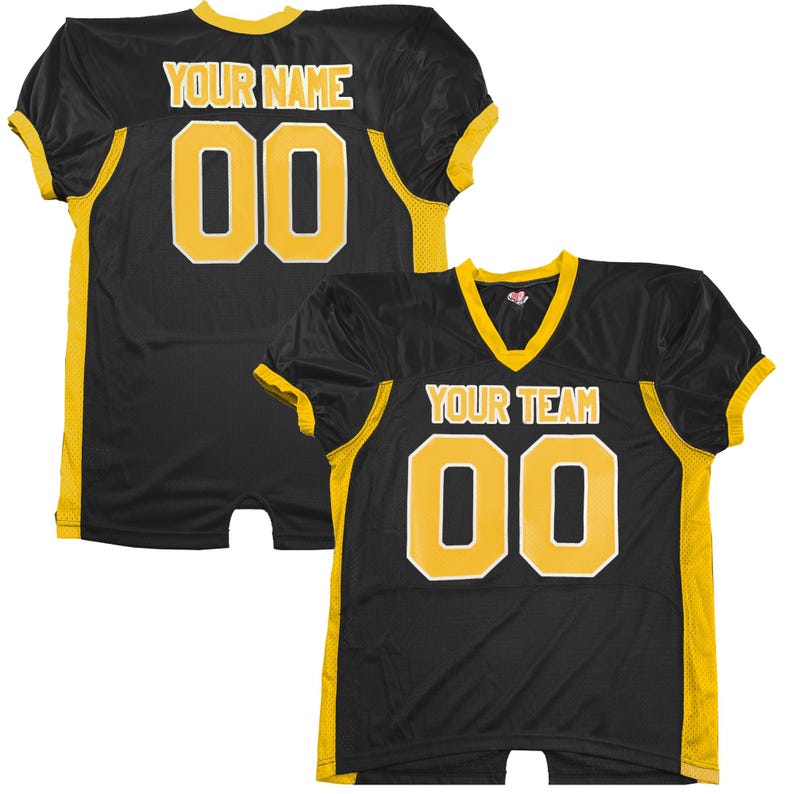 May include: Two black football jerseys with gold trim. One features "YOUR NAME" and the number "00". The other displays "YOUR TEAM" and the number "00". Both jerseys have a V-neck collar and are made of a mesh material.