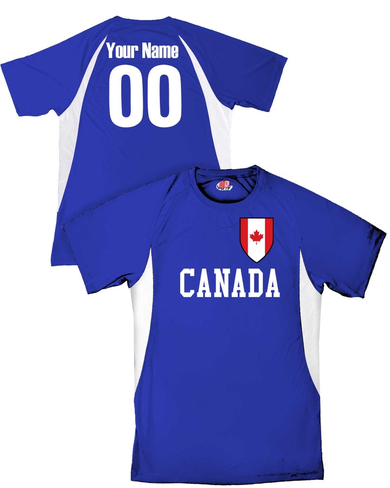 May include: Blue and white athletic jersey with the word "CANADA" in white block letters and a Canadian flag emblem. The back of the jersey has the number "00" in white and the words "Your Name" above it.
