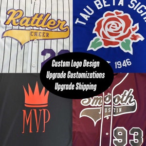 May include: Four baseball jerseys with different designs. The first jersey is white with black stripes and has the text "Rattler CHEER" in yellow and purple. The second jersey is blue with a red rose and the text "TAU BETA SIGMA 1946". The third jersey is black with a red crown and the text "MVP". The fourth jersey is maroon with the text "Smooth JUSTIN 93" in black.