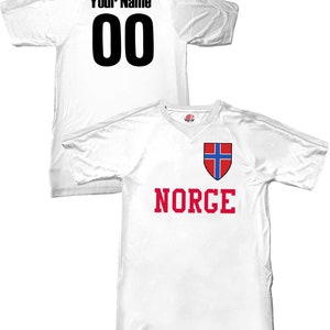 May include: White soccer jersey with a red and blue Norwegian flag on the left chest and the word "NORGE" in red letters below. The back of the jersey has a black number "00" and the words "Your Name" above the number.