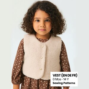 May include: A child wearing a beige, button-up vest over a brown floral print dress. The vest has a soft, textured appearance. Text on the image reads "VEST (EN DE FR) 0 Mos - 14 Y Sewing Patterns."