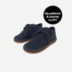 May include: A pair of dark navy blue shoes with thick matching laces and a tan rubber sole featuring visible stitching. A black circular graphic in the upper right corner contains the white text: diy patterns & tutorial 10 sizes.