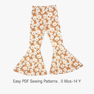 Puede incluir: Pantalones de campana con un estampado floral blanco y naranja sobre un fondo oscuro. Los pantalones tienen una cintura elástica y piernas acampanadas. El texto debajo de los pantalones dice: Easy PDF Sewing Patterns . 0 Mos-14 Y.